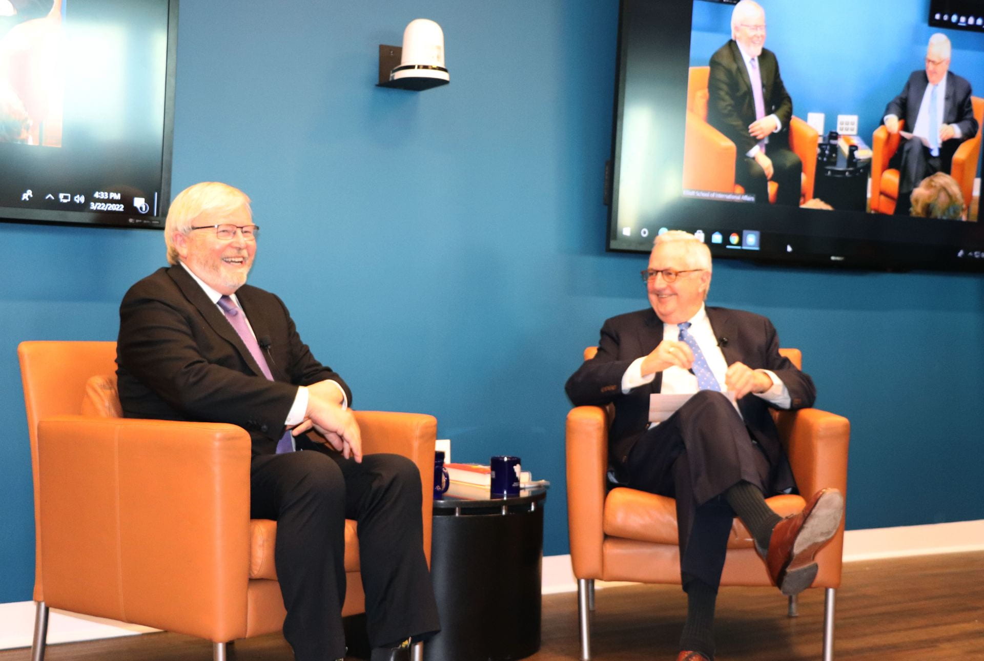 Kevin Rudd and David Shambaugh talking and laughing