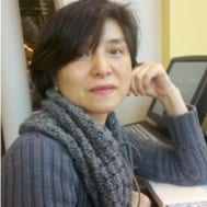 Shoko Hamano sitting at desk
