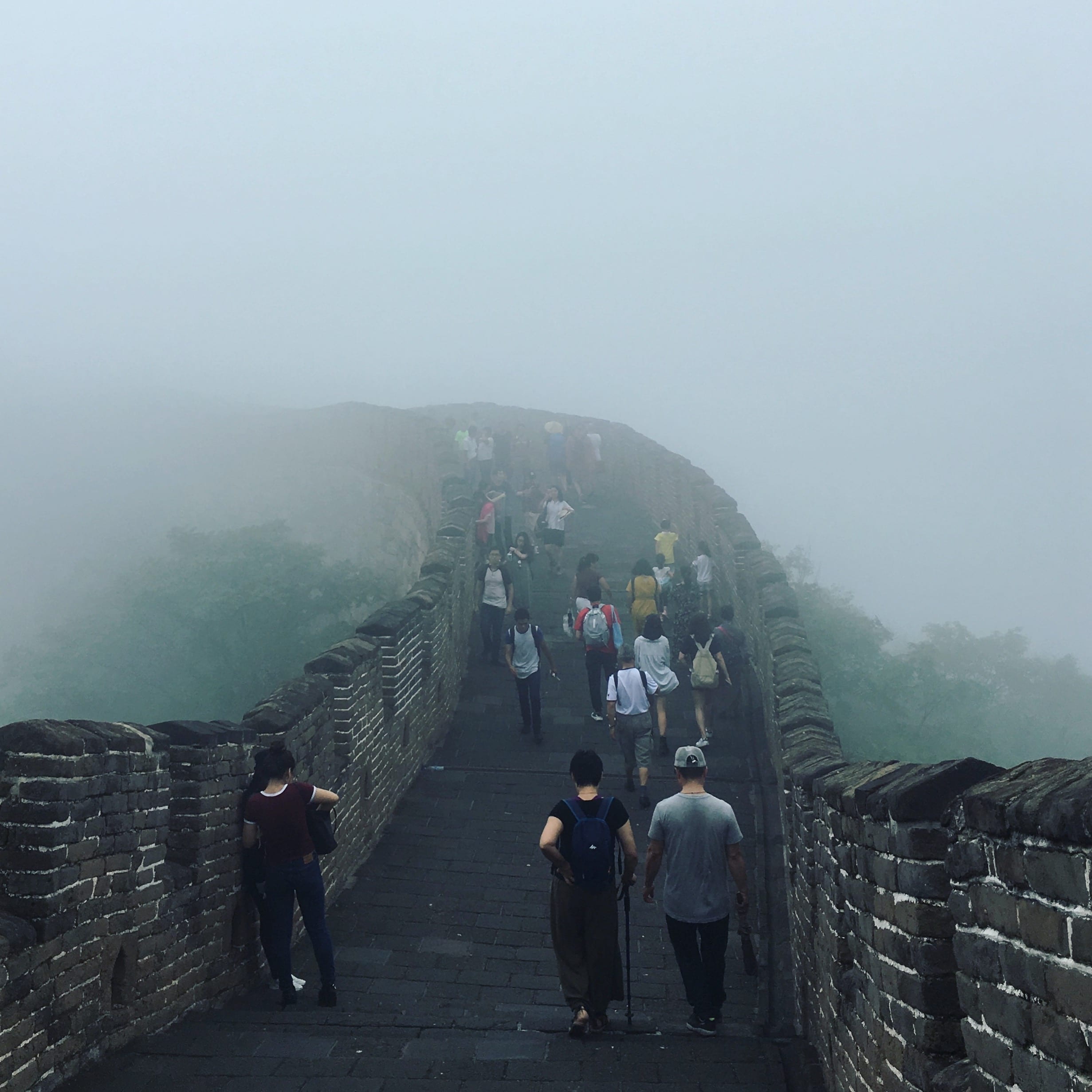 hiking the Great Wall of China on a foggy day