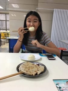 photo of the article's author eating chinese food