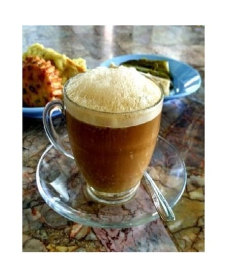 indonesian coffee drink mixed with eggs with breakfast sides