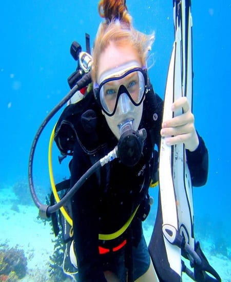 Chloe King, pictured scuba diving