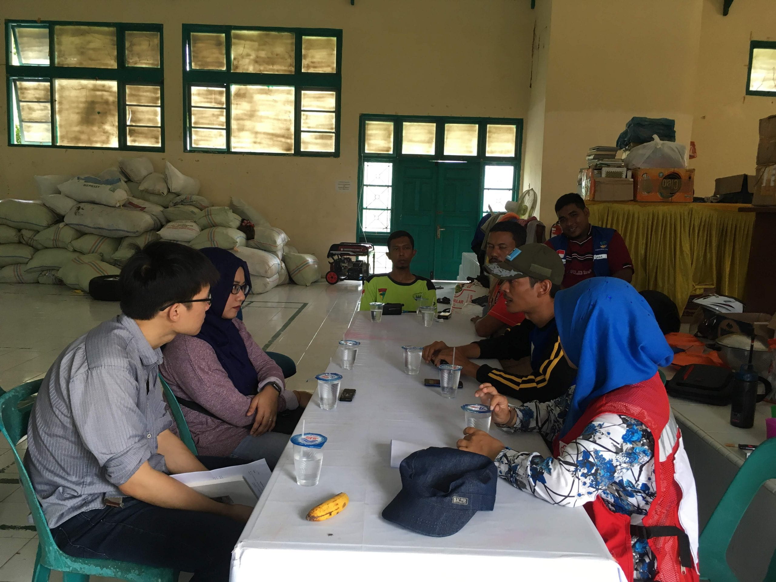 Aceh volunteers share their experiences with the author 