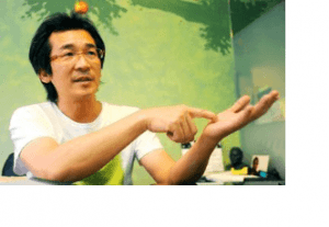 Photo of Wei Te-Sheng with green background