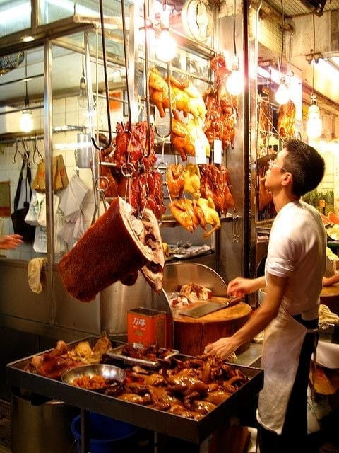duck shop in china with roasted ducks hung up