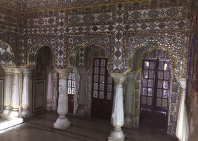 Moon palace at Jaipur; fancy interior historical Mughal architecture with various designs on the walls, columns, and doors