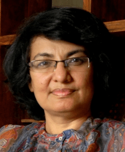 headshot of navnita behera wearing glasses