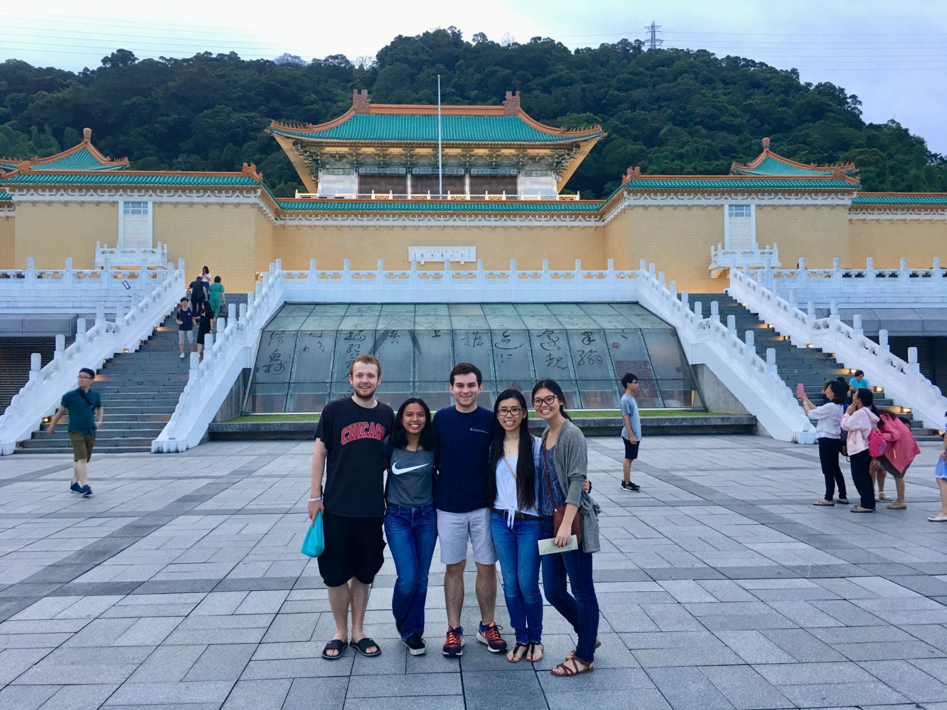 Five Sigur language students pose together in front of the National Taiwan Museum