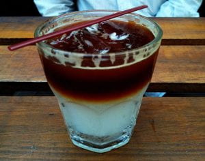 glass of kopi nira, an Indonesian coffee drink