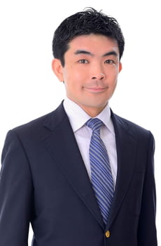 Shinji Yamaguchi poses in a suit in front of a white background
