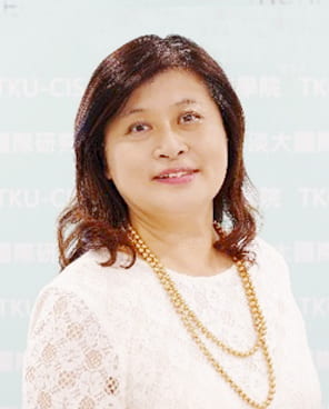 Headshot of Juoyu Joyce Lin in white dress