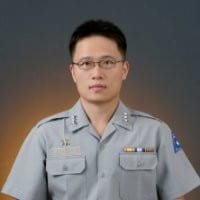 headshot of Kee Shin Choi in military uniform