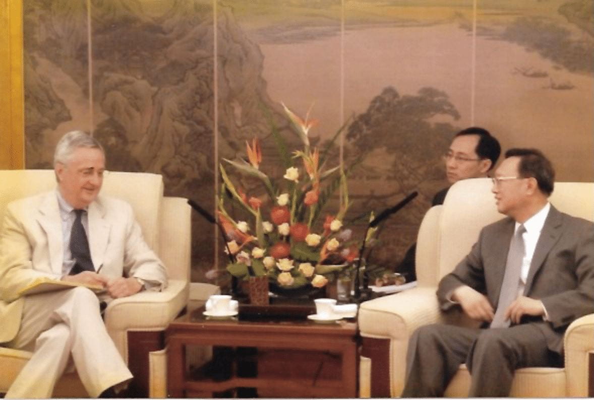 David Shambaugh and Yang Jiechi talking in a Chinese styled room 
