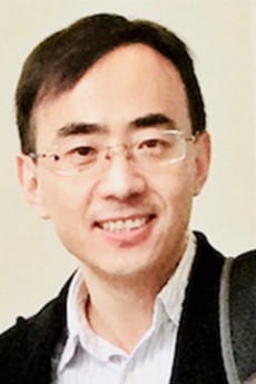 headshot of hongyuan dong in professional attire