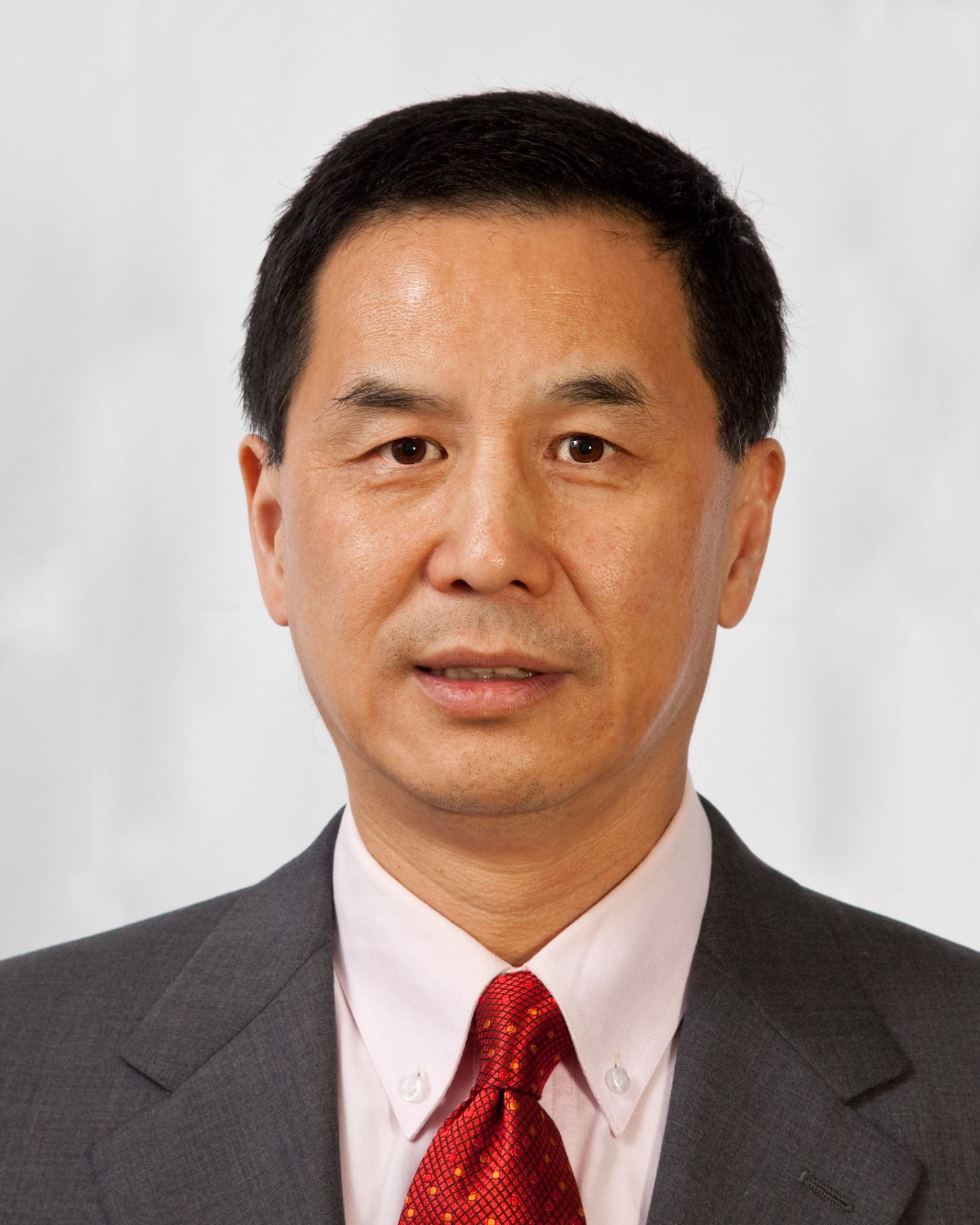 headshot of Jie Chen with white background