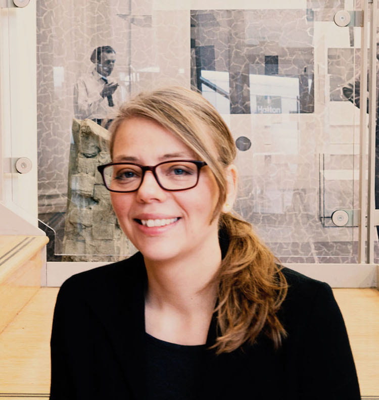 portrait of Gitte Marianne Hansen in an office space