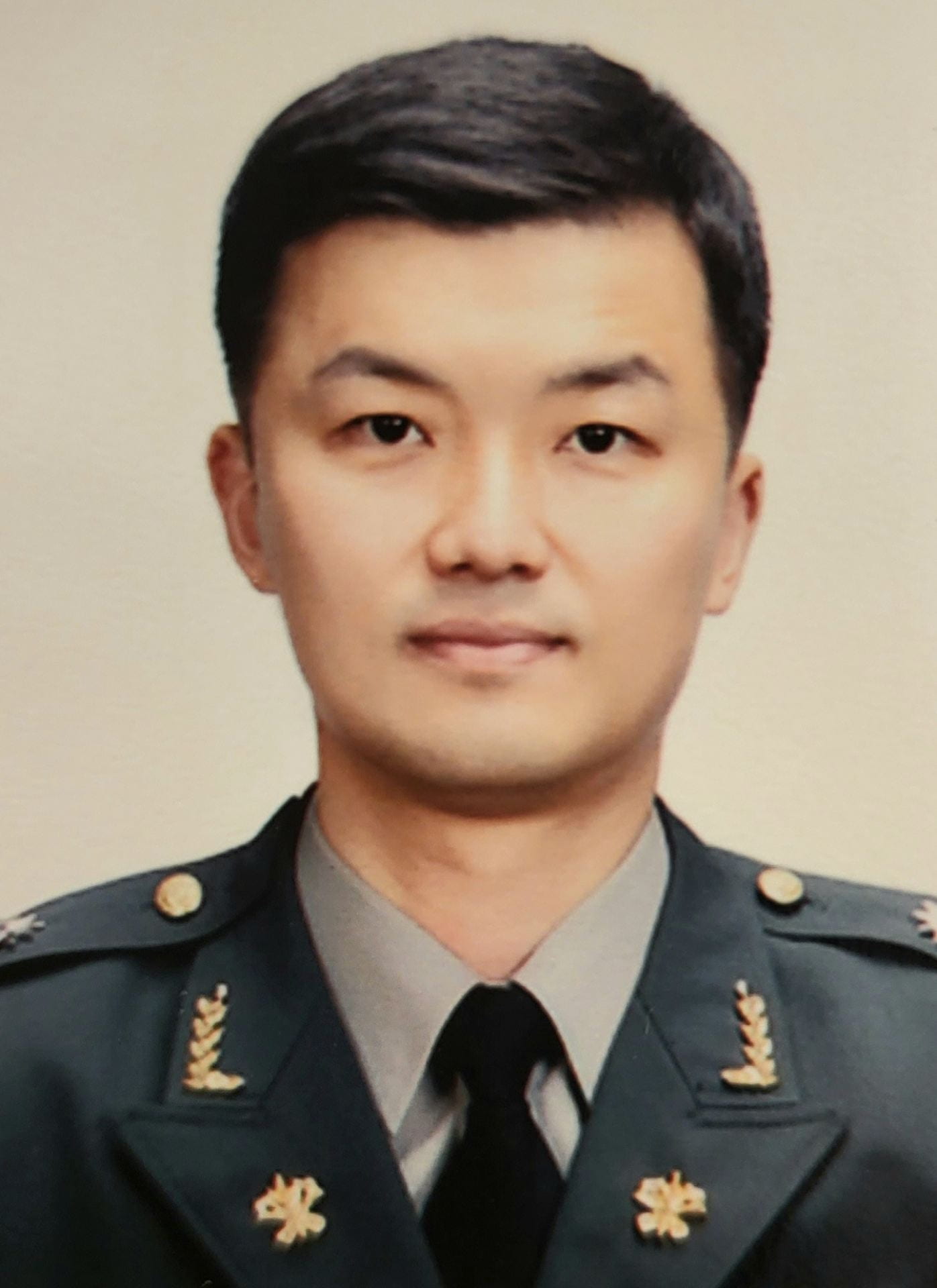 headshot of Donghwan Lee in military uniform