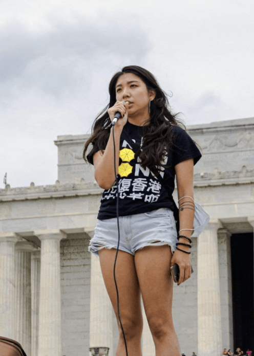 June Lin speaking in front of the Lincoln Memorial