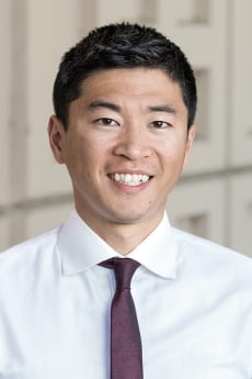 A headshot of Jeffrey Ding