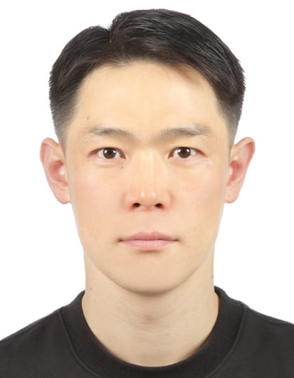 A picture of Hoimin Kim wearing a black t-shirt and looking at the camera