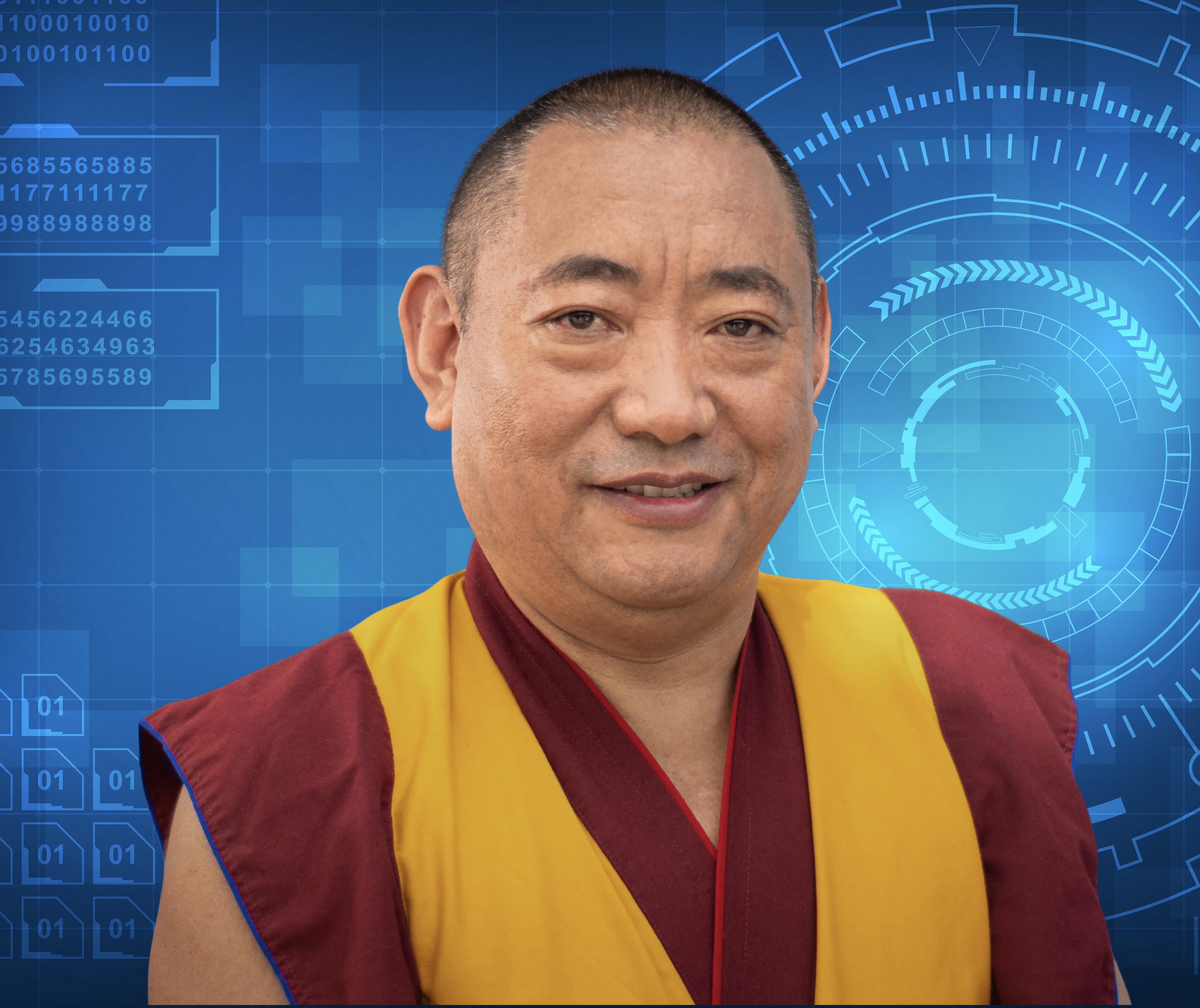 A picture of Geshe Monlam, smiling and looking at the camera